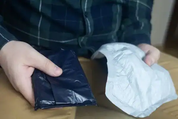 image of man holding stool incontinence Liverpool products